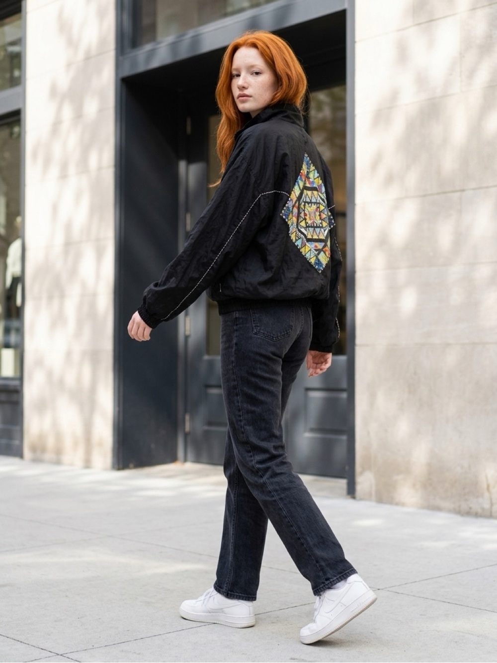 Ellesse Black Bomber Jacket with Colorful Geometric Back Panel